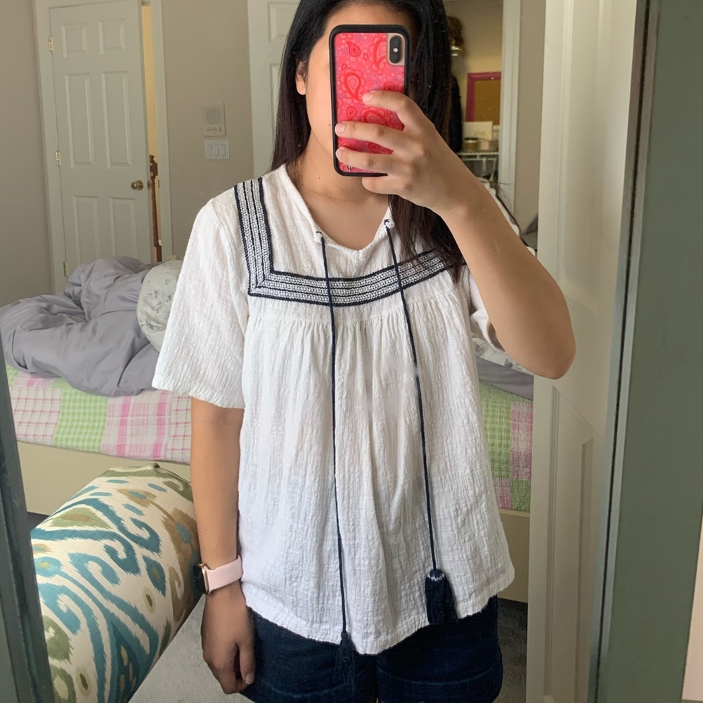 White and blue blouse
